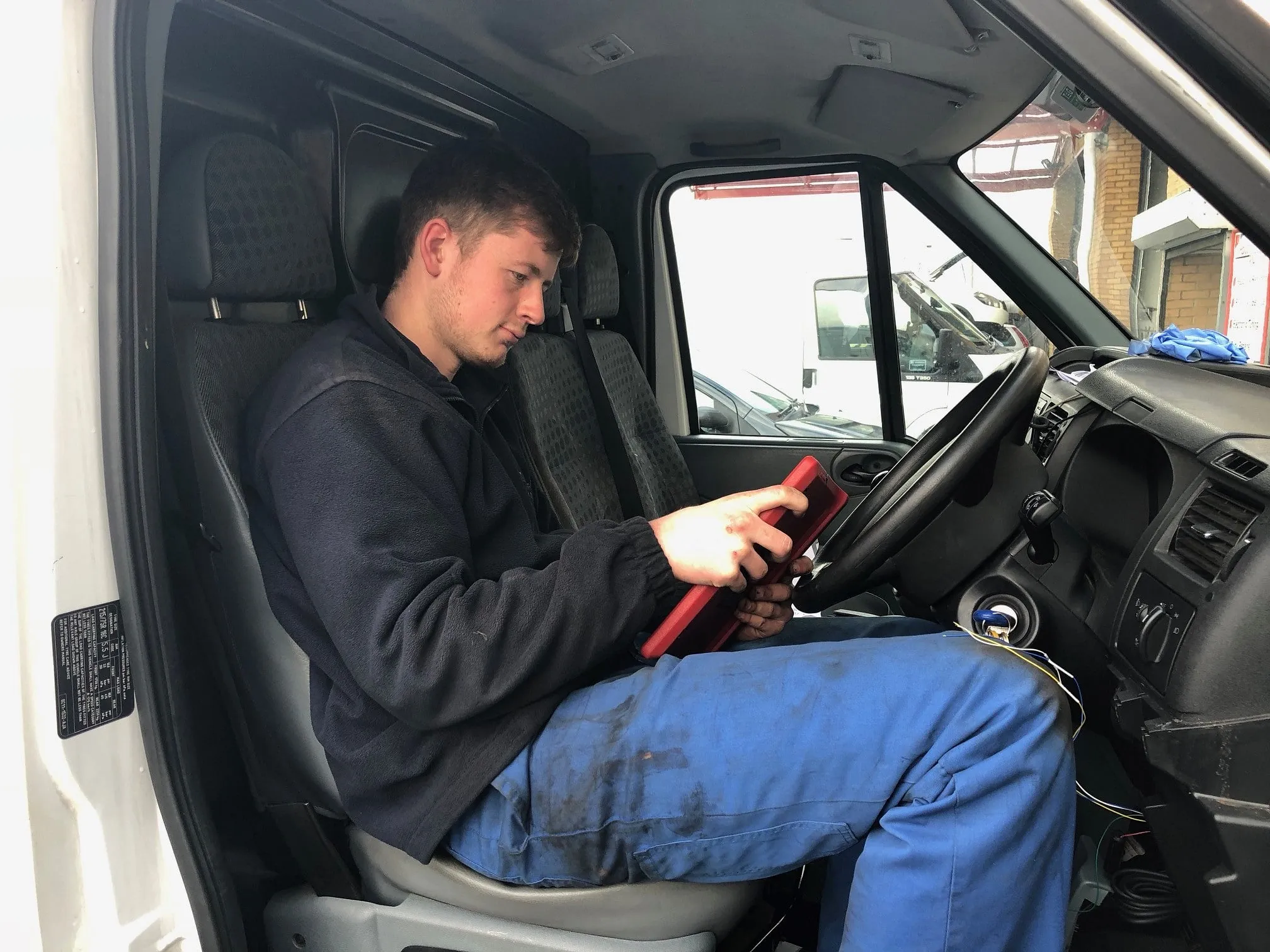 Mechanic running diagnostic checks